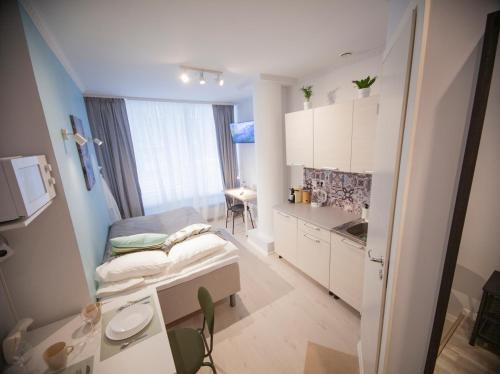 Bed, Cozy small studio in a heart of Tallinn Kunderi street in Torupilli Bed, Cozy small studio in a heart of Tallinn Kunderi street in Torupilli