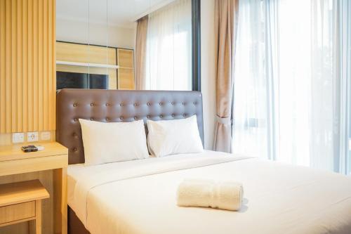 Cozy 3BR Asatti Apartment near ICE BSD By Travelio