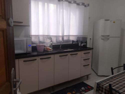 Casa nova com piscina em Itanhaém!! (Casa nova com piscina em Itanhaem!!) in มาร์โรโกส Casa nova com piscina em Itanhaém!! (Casa nova com piscina em Itanhaem!!) in มาร์โรโกส