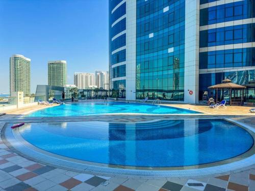 Swimming pool, Large 2 BDR - Al Reem - City of Lights - Mangroves in Al Maryah Island Swimming pool, Large 2 BDR - Al Reem - City of Lights - Mangroves in Al Maryah Island