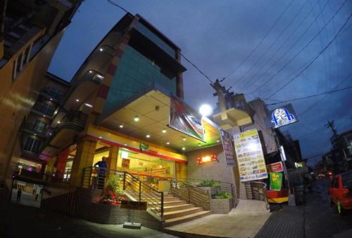 Vista exterior, RedDoorz Plus @ Taj Hotel Tuguegarao in Tuguegarao City Vista exterior, RedDoorz Plus @ Taj Hotel Tuguegarao in Tuguegarao City
