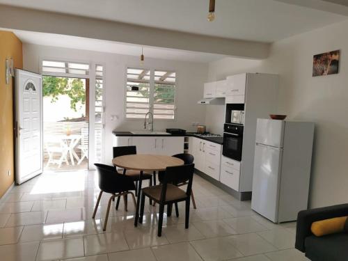 Charmant T2 bas de villa in Saint-Claude Charmant T2 bas de villa in Saint-Claude
