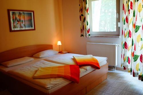 This photo about Ferienhauser 'Am Lubbesee' shared on HyHotel.com