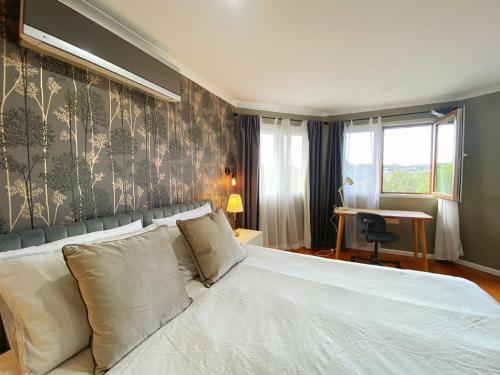Aussie Escape Poolside Comfort and Relaxation in Campbelltown Aussie Escape Poolside Comfort and Relaxation in Campbelltown