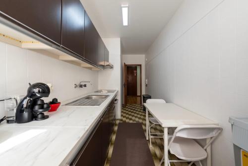 Kitchen, Maia's Cozy Apartment in Valongo Kitchen, Maia's Cozy Apartment in Valongo