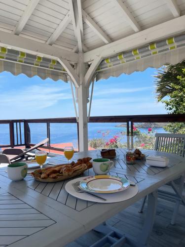 Balcony/terrace, Villa vue panoramique sur La Reserve Cousteau in Bouillante Balcony/terrace, Villa vue panoramique sur La Reserve Cousteau in Bouillante