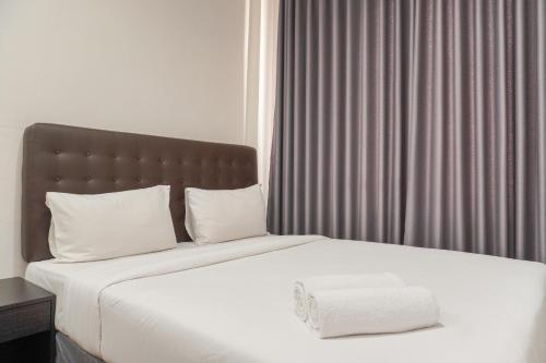 Simply Cozy 1BR at Asatti Apartment By Travelio