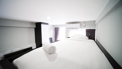 Cozy Living Studio at Bale Hinggil Apartment By Travelio