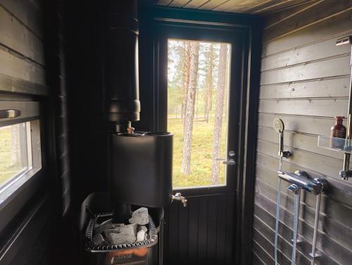 Sauna, Lapland Riverside, Landscape Cabin, KUUKKELI 6, Yllas, Tiny Home with Sauna, Fireplace, Terrace, BBQ in Kuertunturi Sauna, Lapland Riverside, Landscape Cabin, KUUKKELI 6, Yllas, Tiny Home with Sauna, Fireplace, Terrace, BBQ in Kuertunturi