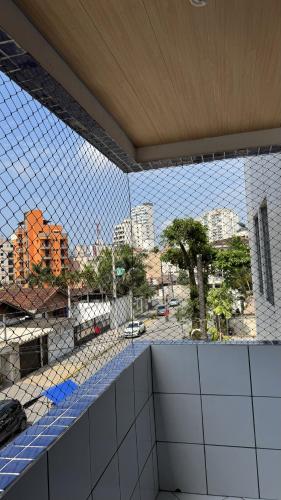 Balcony/terrace, Apartamento uma Quadra da Praia das Asturias in Vila Luis Antonio Balcony/terrace, Apartamento uma Quadra da Praia das Asturias in Vila Luis Antonio