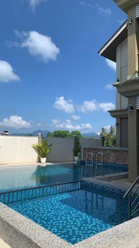 Swimming pool, Grand Village Inn in Gunung Raya Swimming pool, Grand Village Inn in Gunung Raya