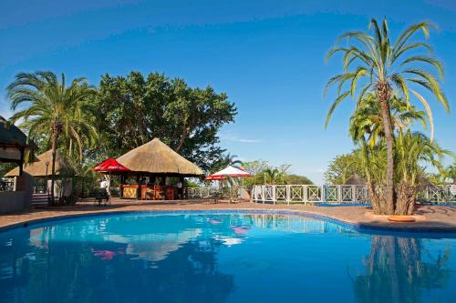 Úszómedence, Elephant Hills Resort near Victoria Falls repülőtér Úszómedence, Elephant Hills Resort near Victoria Falls repülőtér