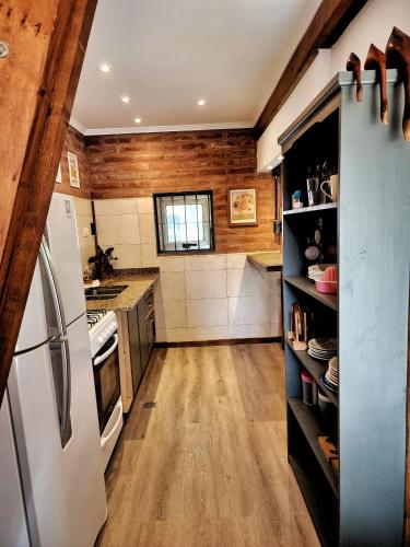 Kitchen, UmanKuyen Fuego y Tierra in Caisamar Kitchen, UmanKuyen Fuego y Tierra in Caisamar