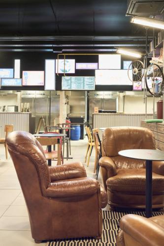 Lounge/area TV in comune, JOST Hotel Lille Wazemmes in Lille Lounge/area TV in comune, JOST Hotel Lille Wazemmes in Lille