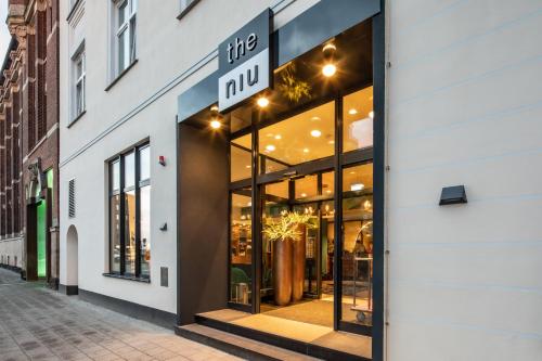 Фасада на хотела, Holiday Inn - the niu, Rig Lubeck By IHG in Любек Фасада на хотела, Holiday Inn - the niu, Rig Lubeck By IHG in Любек