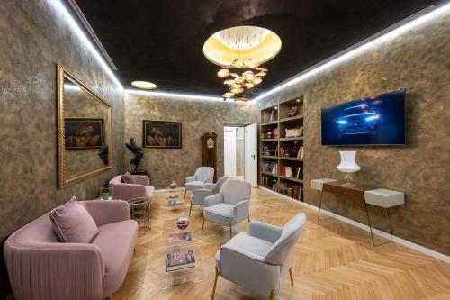 Shared lounge/TV area, Hotel Caravita in Pantheon Shared lounge/TV area, Hotel Caravita in Pantheon