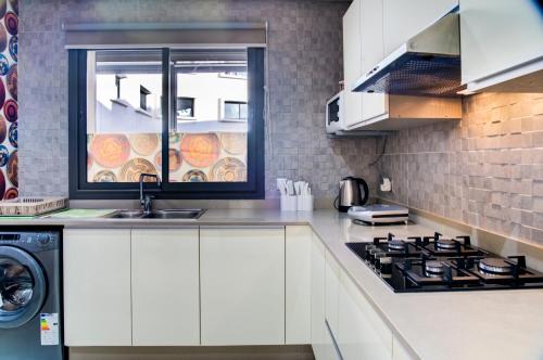 주방, Charmant Appartement au Centre d'Agadir in 아바투아 주방, Charmant Appartement au Centre d'Agadir in 아바투아