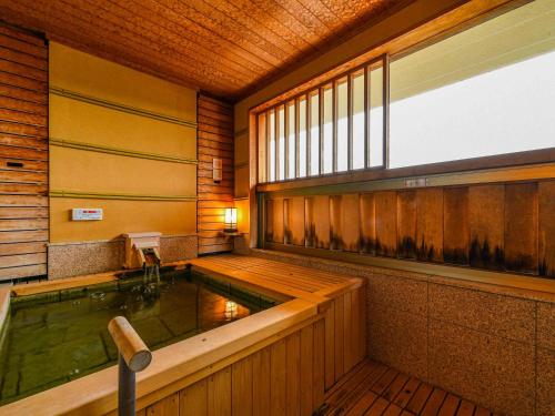 Bilik mandi terbuka, Awara Onsen Mimatsu in Awara Bilik mandi terbuka, Awara Onsen Mimatsu in Awara