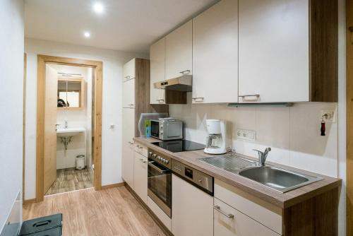 ห้องครัว, Haus Schennach in ฮอลเลนเซิน ห้องครัว, Haus Schennach in ฮอลเลนเซิน