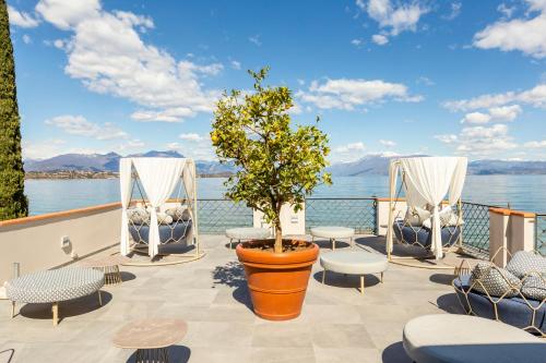 Μπαλκόνι/βεράντα, Club del Sole Desenzano Boutique Resort in Ντεσεντζάνο Ντελ Γκάρντα Μπαλκόνι/βεράντα, Club del Sole Desenzano Boutique Resort in Ντεσεντζάνο Ντελ Γκάρντα