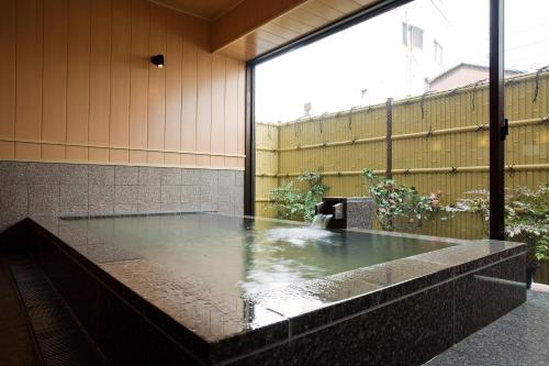 Kamar Mandi, Kotohira River Side Hotel in Kotohira Kamar Mandi, Kotohira River Side Hotel in Kotohira