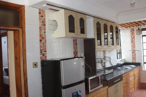 Kitchen, Eshborns House - Near Jomo Kenyatta International Airport and SGR with shuttle services in Nairobi Kitchen, Eshborns House - Near Jomo Kenyatta International Airport and SGR with shuttle services in Nairobi