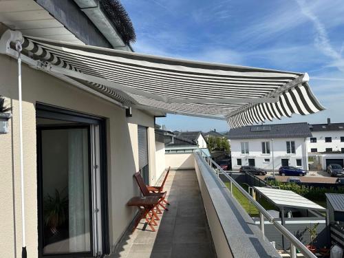 陽台/露台, Family apartment in Erlensee - Autobahn A45 A66 - Frankfurt Airport FRA in 埃爾倫塞 陽台/露台, Family apartment in Erlensee - Autobahn A45 A66 - Frankfurt Airport FRA in 埃爾倫塞