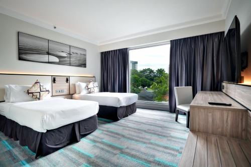 Utsikt, Thistle Johor Bahru Hotel in Johor Baharu Utsikt, Thistle Johor Bahru Hotel in Johor Baharu
