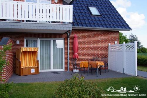 Balcony/terrace, 22 Ferienwohnung Fuhr An der Reiterkoppel 1 EG in Fehmarn Balcony/terrace, 22 Ferienwohnung Fuhr An der Reiterkoppel 1 EG in Fehmarn