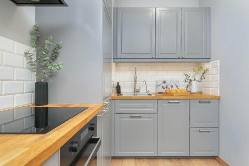 Cozinha, Przytulny Apartament z Parkingiem Lawendowe Wzgórze by Noclegi Renters (Przytulny Apartament z Parkingiem Lawendowe Wzgorze by Noclegi Renters) in Jasien Cozinha, Przytulny Apartament z Parkingiem Lawendowe Wzgórze by Noclegi Renters (Przytulny Apartament z Parkingiem Lawendowe Wzgorze by Noclegi Renters) in Jasien