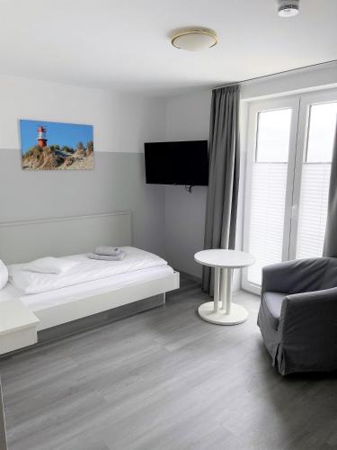 Einzelzimmer-14-OG-Meerblick in Borkum Einzelzimmer-14-OG-Meerblick in Borkum