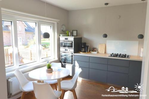 Kitchen, 50 Ferienhaus Auszeit Gollendorf 22 in Fehmarn Kitchen, 50 Ferienhaus Auszeit Gollendorf 22 in Fehmarn