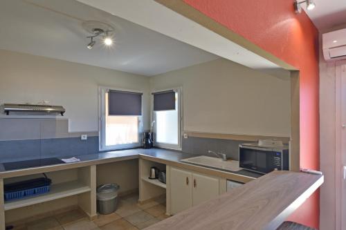 Cocina, Calvi Résidence, Appart'hôtel (Calvi Residence, Appart'hotel) in Calvi Cocina, Calvi Résidence, Appart'hôtel (Calvi Residence, Appart'hotel) in Calvi