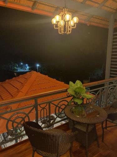 Terraza/balcón, Elegant holiday homes Coorg in Coorg Terraza/balcón, Elegant holiday homes Coorg in Coorg