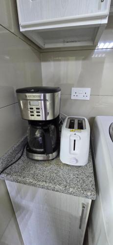 Kitchen, Olaando hostel near Aldar HQ Building Kitchen, Olaando hostel near Aldar HQ Building