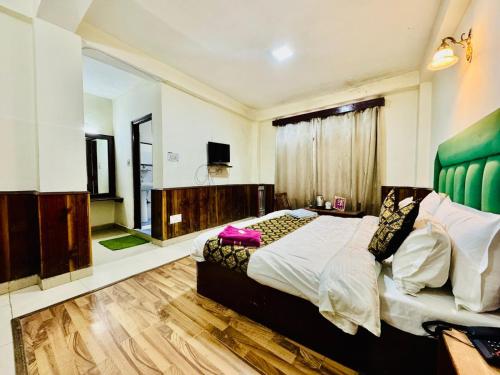 Bed, Silver Land with mountain view - A River side property in Simsa Village Bed, Silver Land with mountain view - A River side property in Simsa Village