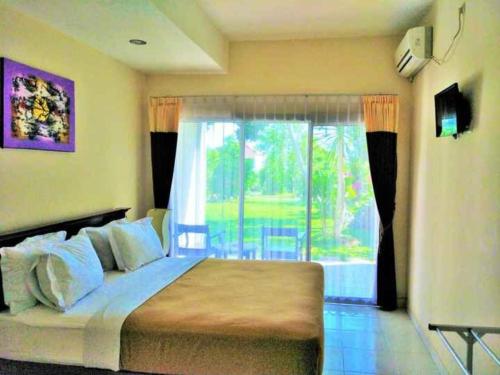 Minak Jinggo Hotel in Glenmore Minak Jinggo Hotel in Glenmore