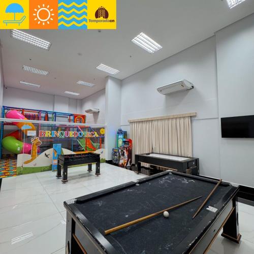 Shared lounge/TV area, Piazza diRoma com acesso ao Acqua Park - Temporada CN in Jardim Roma Shared lounge/TV area, Piazza diRoma com acesso ao Acqua Park - Temporada CN in Jardim Roma