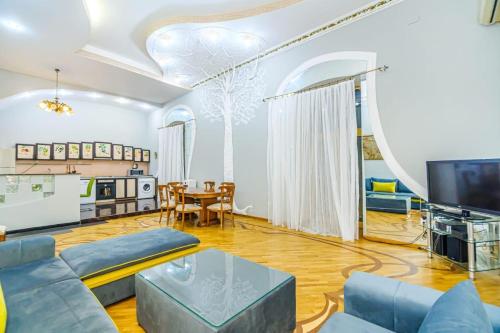 Ortak salon/TV alanı, Malakan Nizami City Hotel Baku And Apartments in Bakü Ortak salon/TV alanı, Malakan Nizami City Hotel Baku And Apartments in Bakü