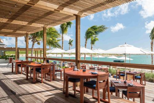餐厅, Ambergris Cay Private Island All Inclusive - PLS Island Hopper Flight Included in 大特克 餐厅, Ambergris Cay Private Island All Inclusive - PLS Island Hopper Flight Included in 大特克