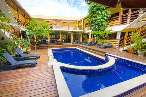 Piscină, Flat Vila Morena a pousada da sua familia in Sao Sebastiao (Sao Paulo) Piscină, Flat Vila Morena a pousada da sua familia in Sao Sebastiao (Sao Paulo)