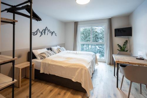 Bed, Studio 54 Davos in Davos Bed, Studio 54 Davos in Davos