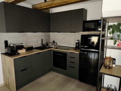 Konyha, Apartamenty Rynek Szamotuły (Apartamenty Rynek Szamotuly) in Szamotuly Konyha, Apartamenty Rynek Szamotuły (Apartamenty Rynek Szamotuly) in Szamotuly