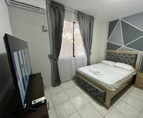 Enorme 3 habitaciones, 7 camas, centro de machala in Machala Enorme 3 habitaciones, 7 camas, centro de machala in Machala