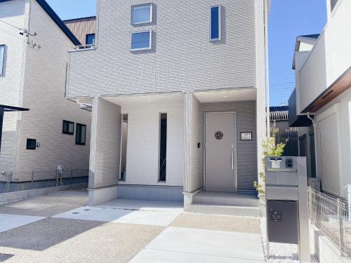Exterior view, House FORMOSA中島 in Minato Exterior view, House FORMOSA中島 in Minato