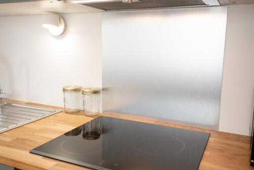 Konyha, Paisible appartement Central & lumineux par Groom in Lorient Konyha, Paisible appartement Central & lumineux par Groom in Lorient