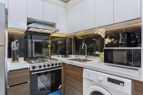 Kitchen, Prival - Spacious Studio at Olivz Residences in Dubai International City Kitchen, Prival - Spacious Studio at Olivz Residences in Dubai International City