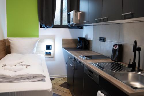 Konyha, Hive Apartments Giesen an der B6 in Giesen Konyha, Hive Apartments Giesen an der B6 in Giesen