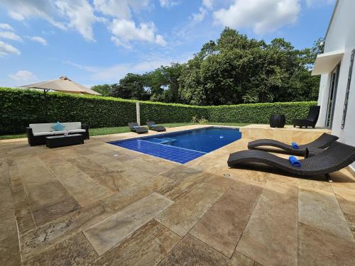 Swimming pool, Girardot Casa estilo mediterraneo con piscina privada in Ricaurte Swimming pool, Girardot Casa estilo mediterraneo con piscina privada in Ricaurte
