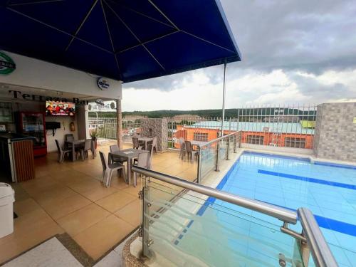 Úszómedence, Hotel Suite Royal in Melgar Úszómedence, Hotel Suite Royal in Melgar